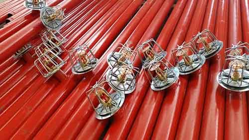 Fire sprinklers ready to be installed'